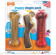 Nylabone Puppy Stages Dog Chew Toy Pack - Puppy Chew Toys for Teething and Chewing - Puppy Supplies - Chicken, Maple Bacon, and Beef Jerky Flavors, Medium/Wolf